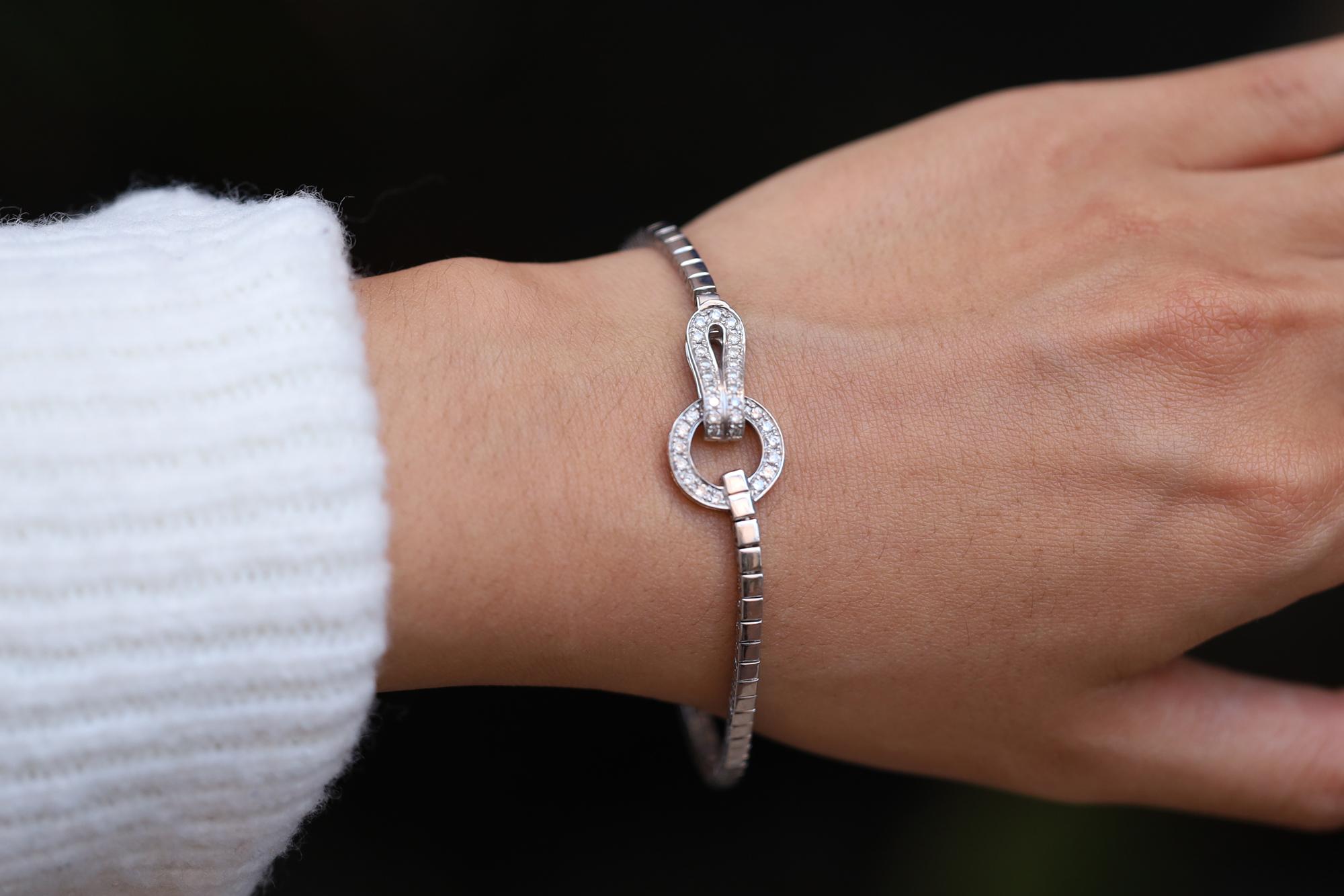 A classy and contemporary designer bracelet, perfectly petite with a chic shimmer. This Italian made bracelet is expertly crafted in luxurious 18k white gold throughout, with a beautiful buckle clasp, easy to don and doff. Laced with 35 natural