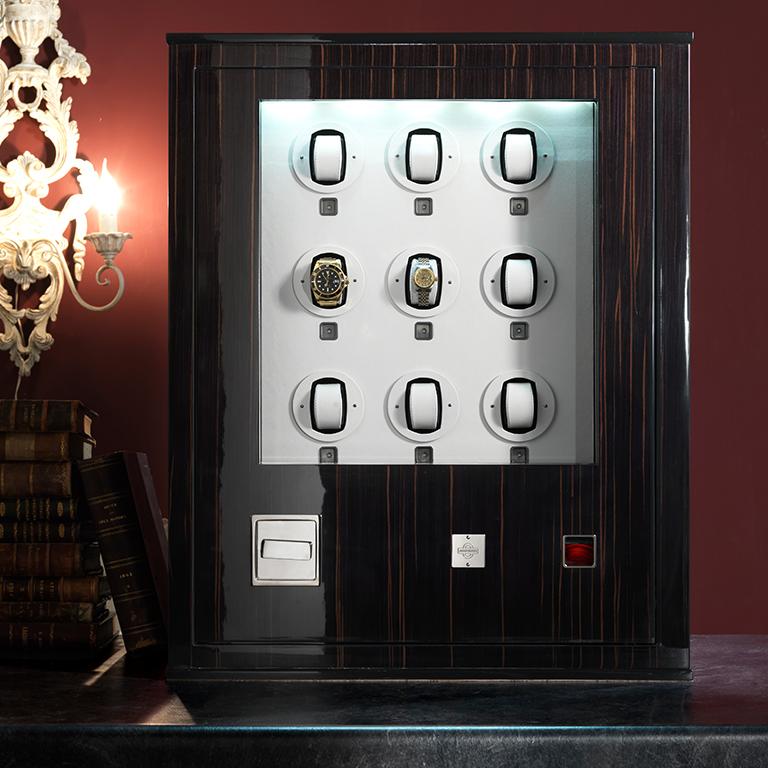 Il Forziere Delle Ore is an armoured chest safe in polished wood with nine winders, bullet proof glass which is anchorable to the wall. Biometric opening device and emergency key system. Watch winders entirely made in Switzerland. Secret