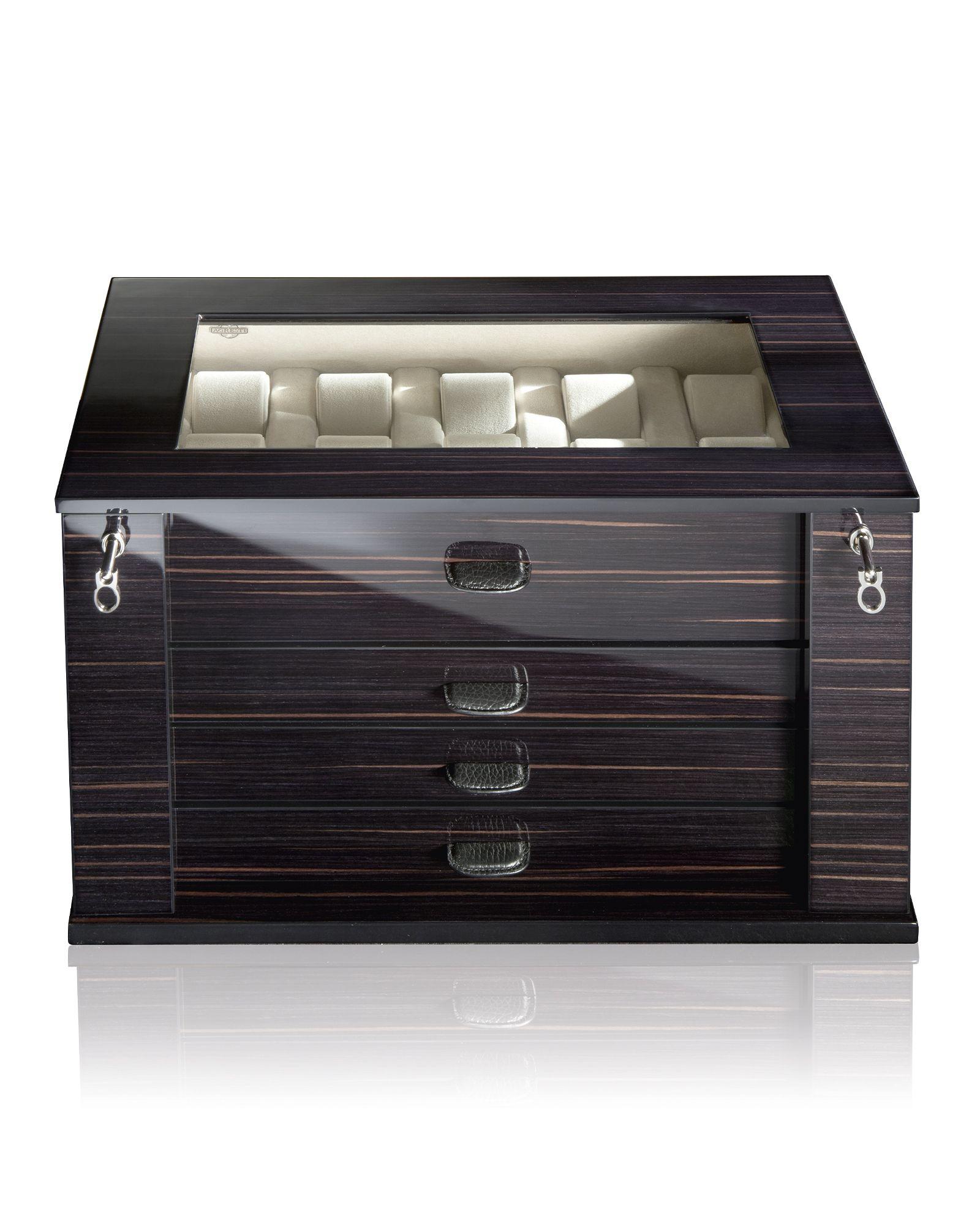 Serious watch collectors only need apply for this last offering from Agresti Firenze. A stunning wooden watch chest, in polished ebony, Il Mio Tempo Ebano offers lockable storage for up to twenty-eight watches. The top drawer, complete with glass