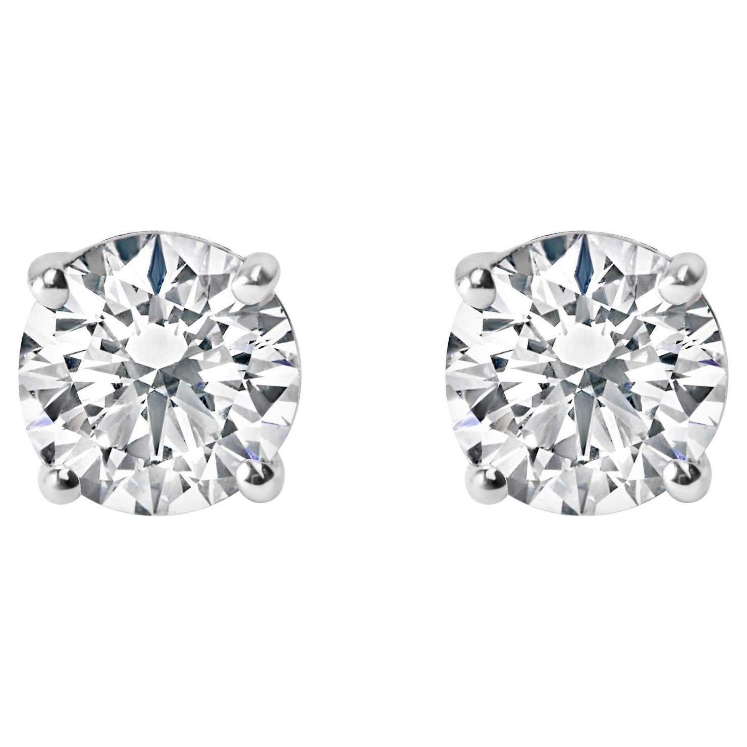Boucles d
oreilles en or blanc 14K certifié AGS 1.0 Cttw diamant solitaire