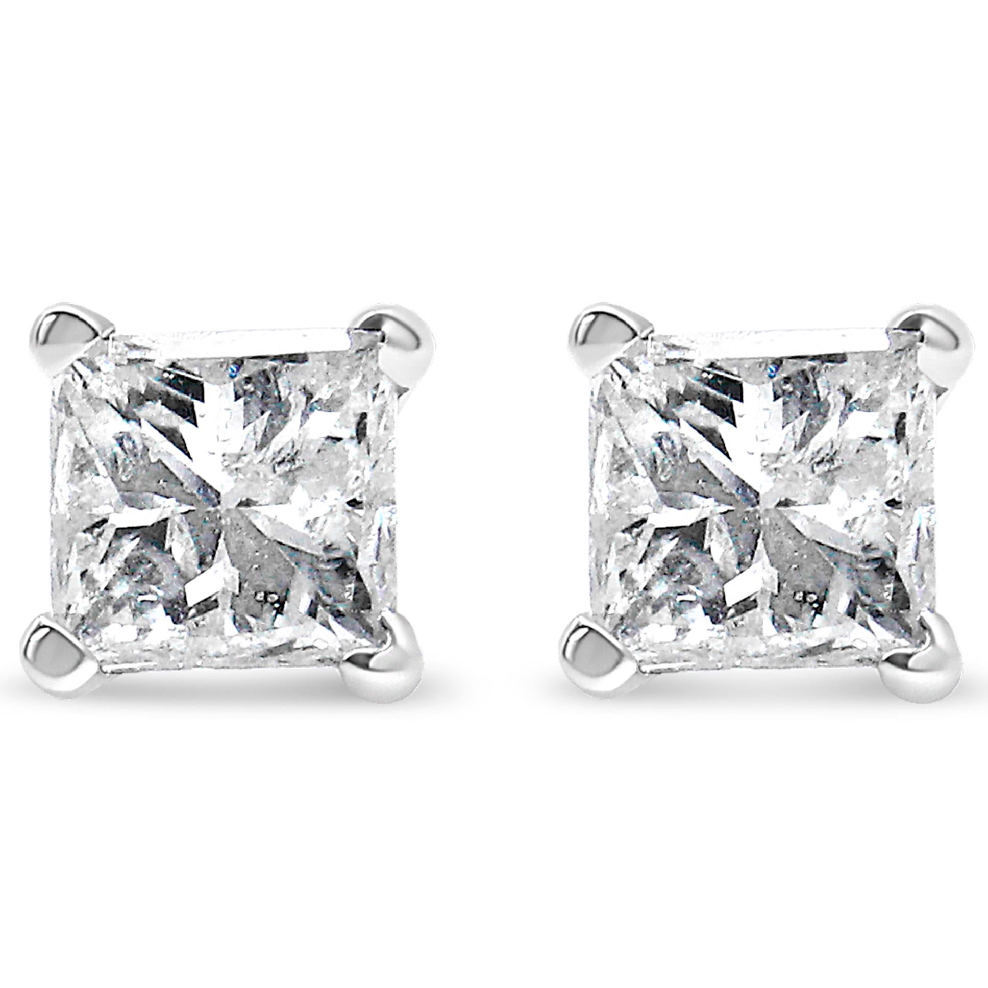 Celebrate any occasion with these classic shimmering diamond stud earrings. Crafted from 14k yellow gold each earring showcases a sparkling princess-cut solitaire diamond in a 4-Prong Setting. Dazzling with 3/8 cttw of diamonds and a bright polished