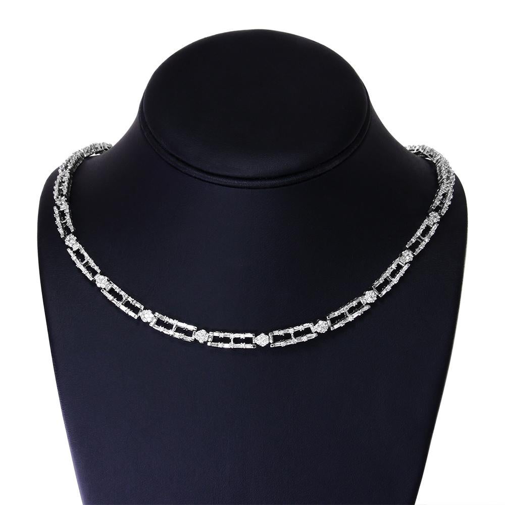 Make a dramatic entrance with this unforgettable diamond choker necklace. Crafted from cool 14K white gold, this exceptional choice dazzles with alternating links of diamond encrusted floral clusters and rectangle links set with baguette and round