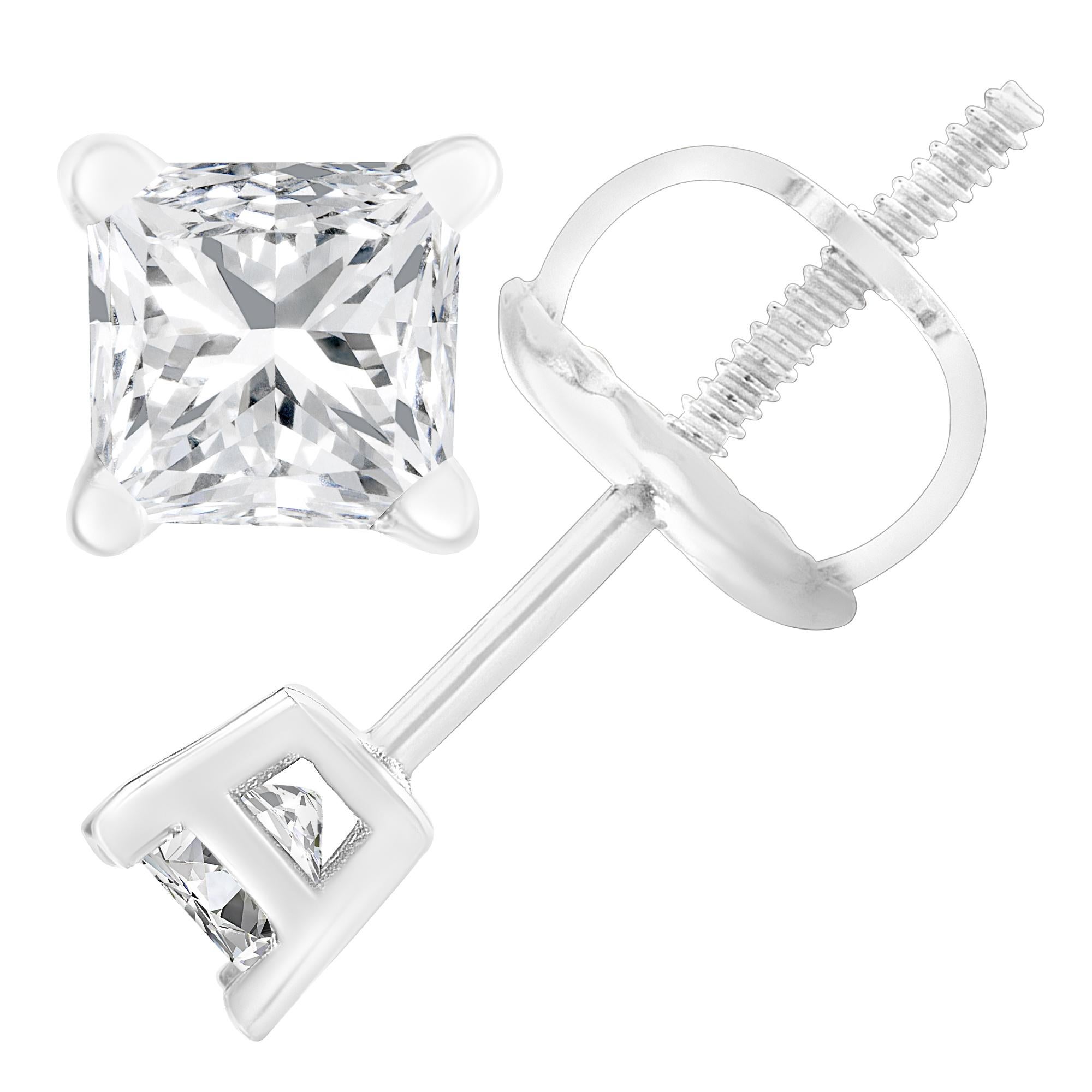 Elegant and classic, these solitaire studs are beautifully set in the finest 18k white gold and shine with a natural, prong-set diamond each. The diamonds are princess-cut and have a total carat weight of 1.0 cttw. These earrings are the perfect