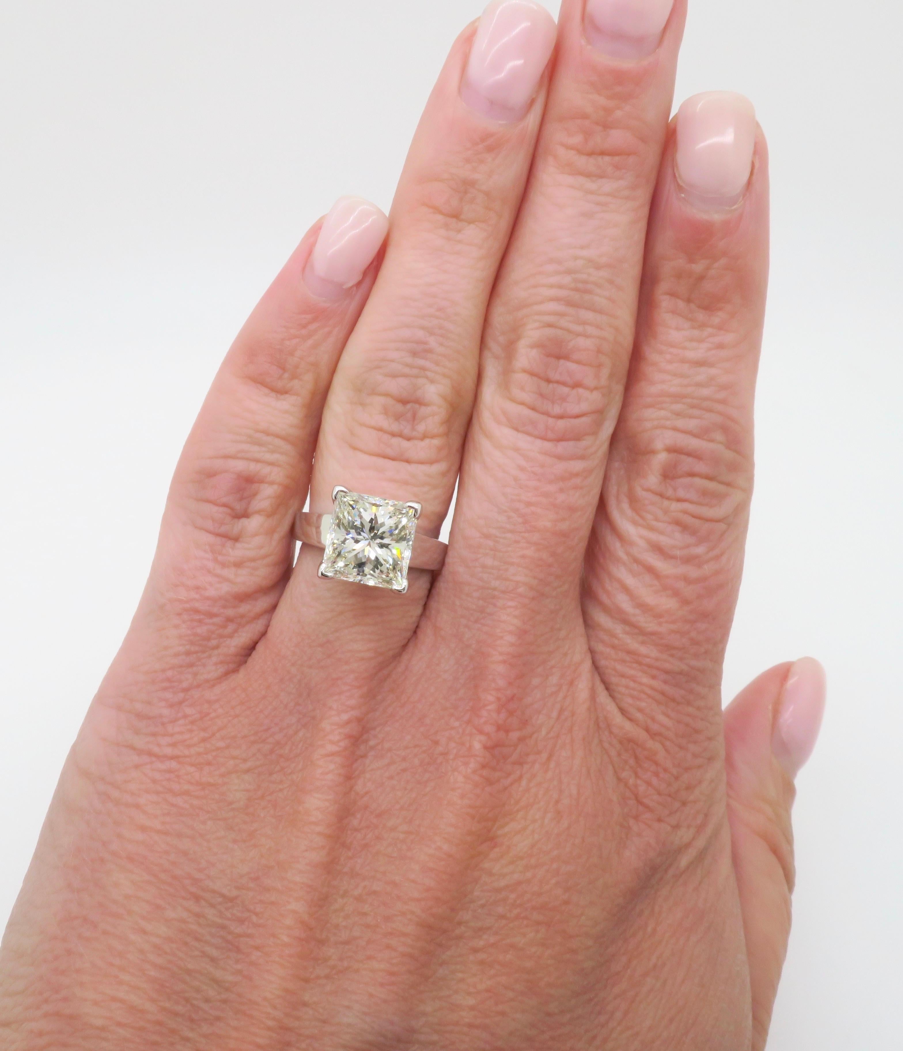 Simply stunning 3.82ct AGS Certified Earth Mined Princess cut diamond solitaire ring. 

Center Diamond Carat Weight: 3.82CT 
Center Diamond Cut: Princess
Center Diamond Color: K
Center Diamond Clarity: SIS
AGS Report: AGS104098874003
Metal: 14k