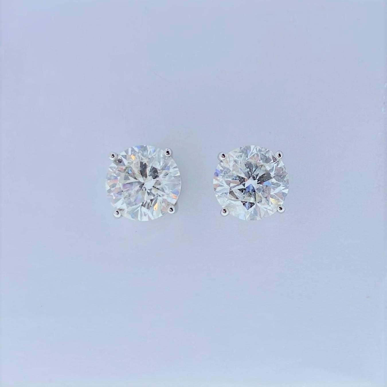 Round Cut AGS Certified 5.12 Carat Total Diamond Stud Earrings in 14 Karat White Gold