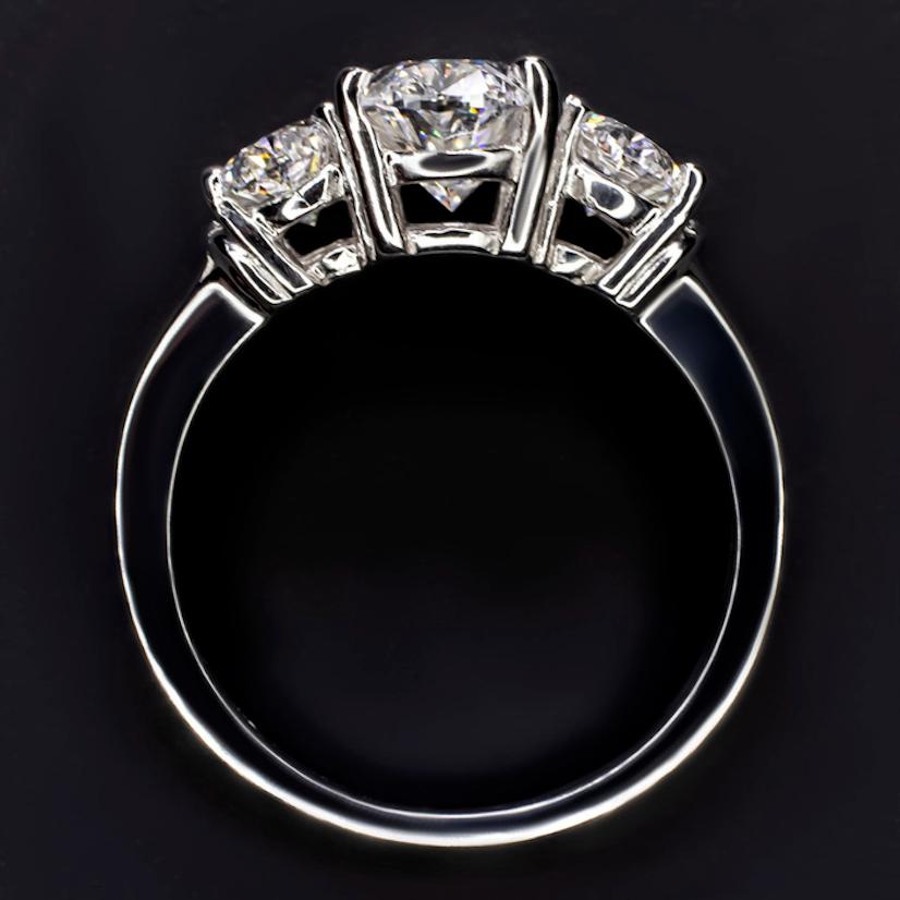 3 carat oval diamond ring on finger