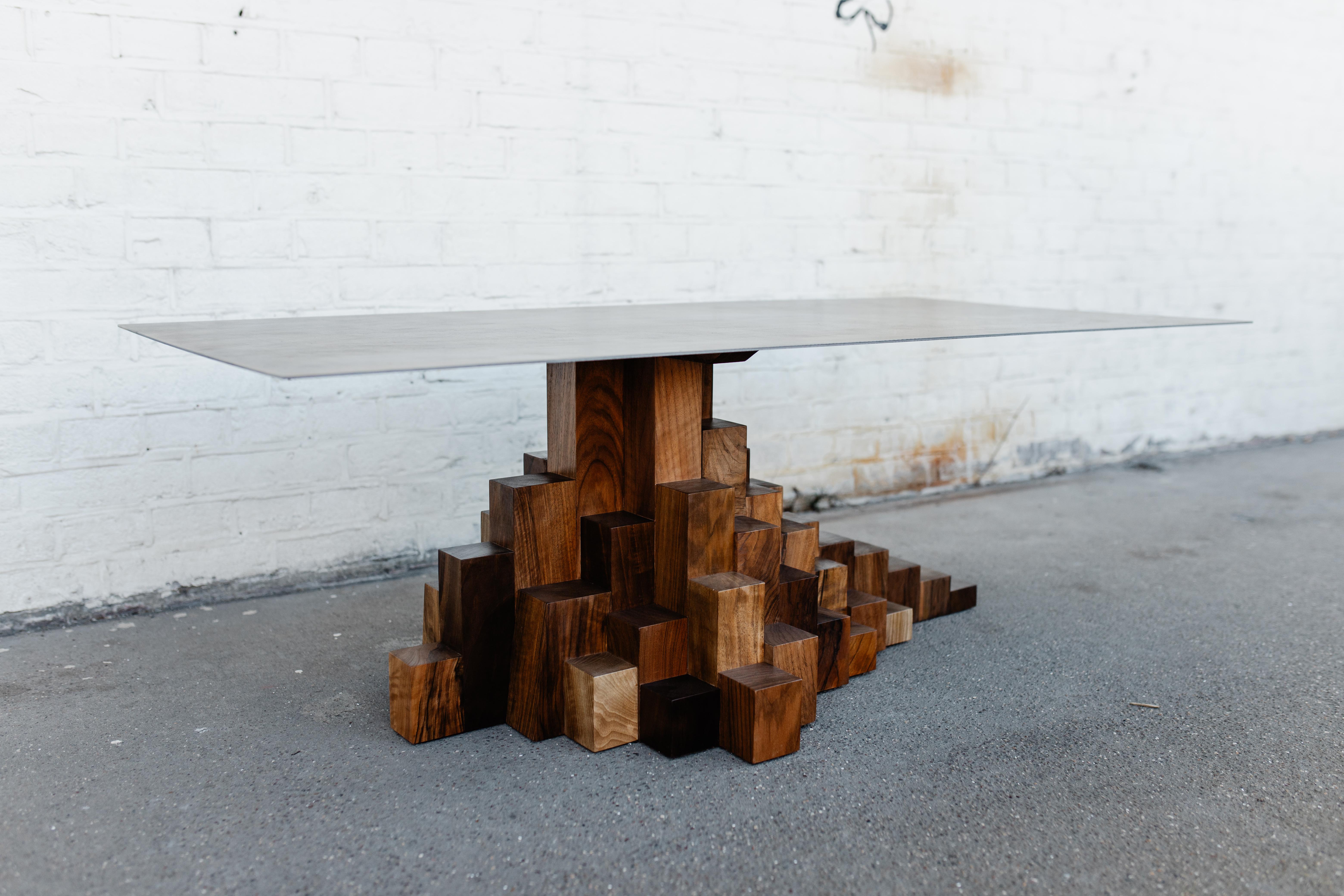 The Ahadi Coffee table is a sculptural brutalist piece. Inspired by nature, it is designed to resemble the strong, bold, strength of a Mountain. The Ahadi pieces are all functional art pieces, carrying both the characteristics of art and a piece of