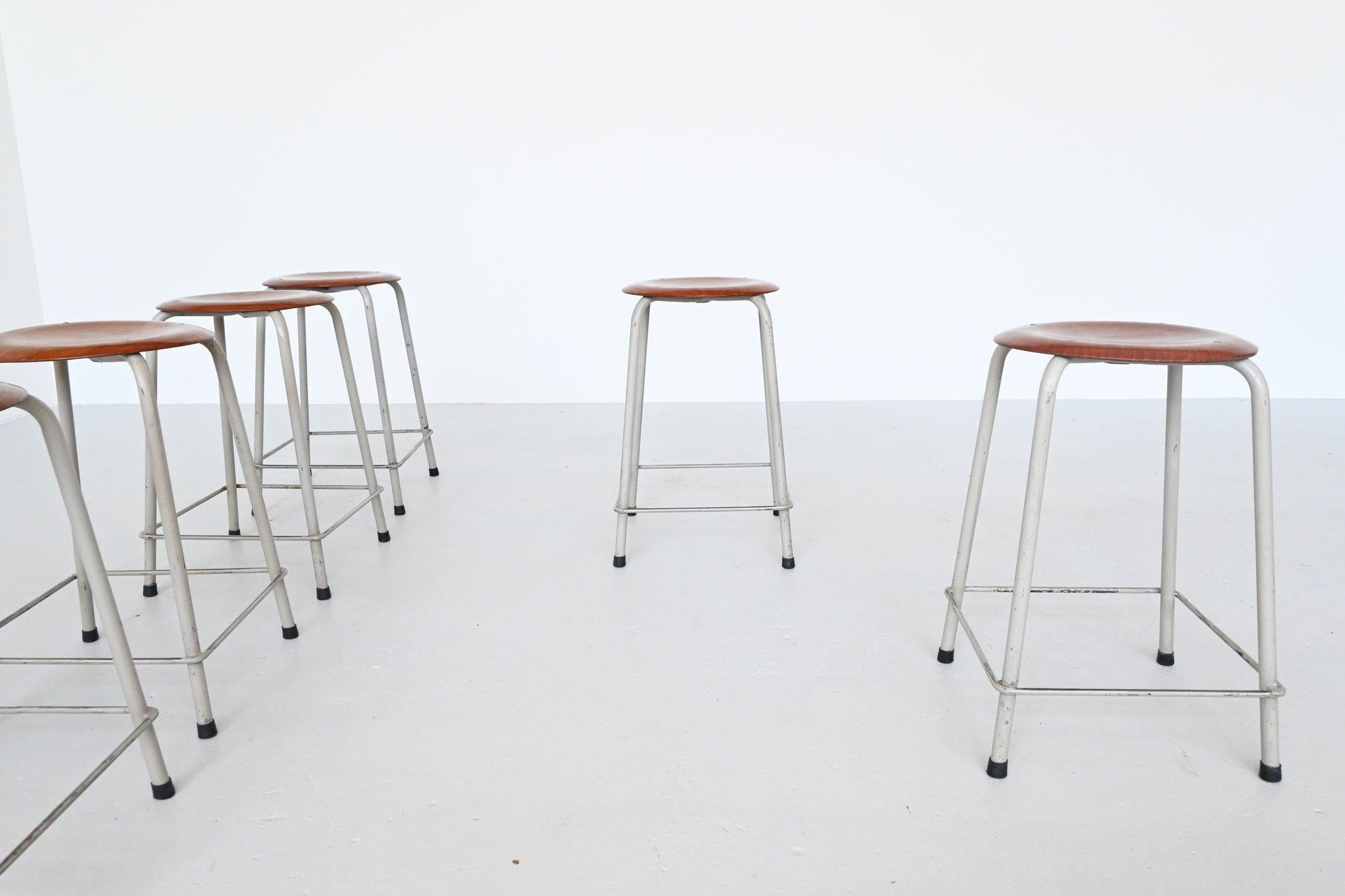 Very nice stools made by Ahrend de Cirkel, the Netherlands, 1970. These stools have a very nice light grey lacquered tubular metal frame and a round teak pagwood seat. The stools are stackable and we have 20 pieces available. All are in very good