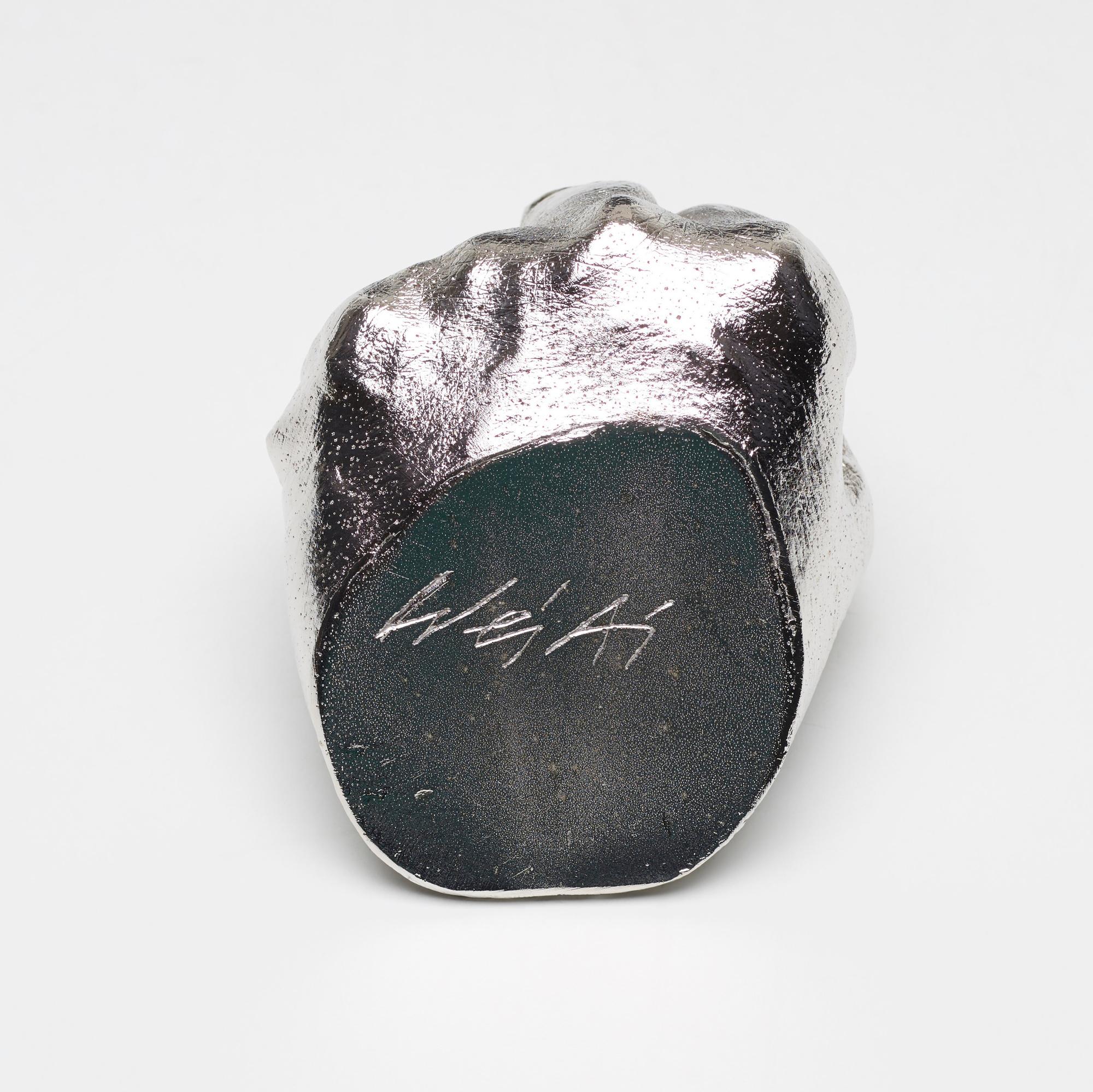 Ai Weiwei (b. 1957)
The Artist’s Hand, 2017
Artist’s signature inscribed on the base
Cast urethane resin multiple with electroplated rhodium, contained in the original cardboard presentation box
12.7 x 10.2 x 10.2 cm (5 x 4 x 4 in.)
Edition of