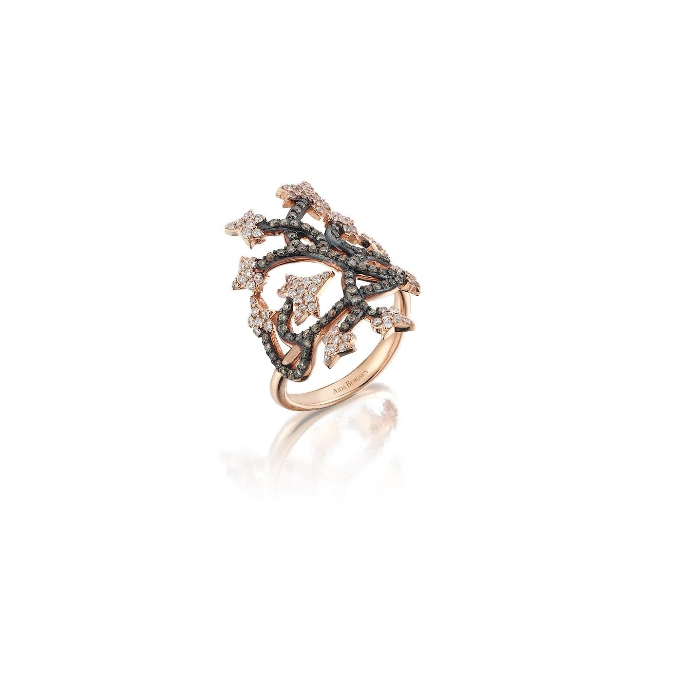 Aida Bergsen Short Ivy ring set in 14k rose gold and rhodium plated blackened rose gold with round brilliant cut white and brown diamonds.

The Ivy Collection is one of Aida Bergsen’s most popular lines. Highly elegant and timeless, these rings can