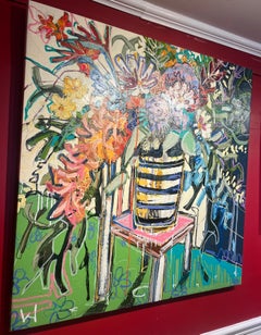 "Sundays are for Sitting", wildflowers spill out of a vase, brightening the room