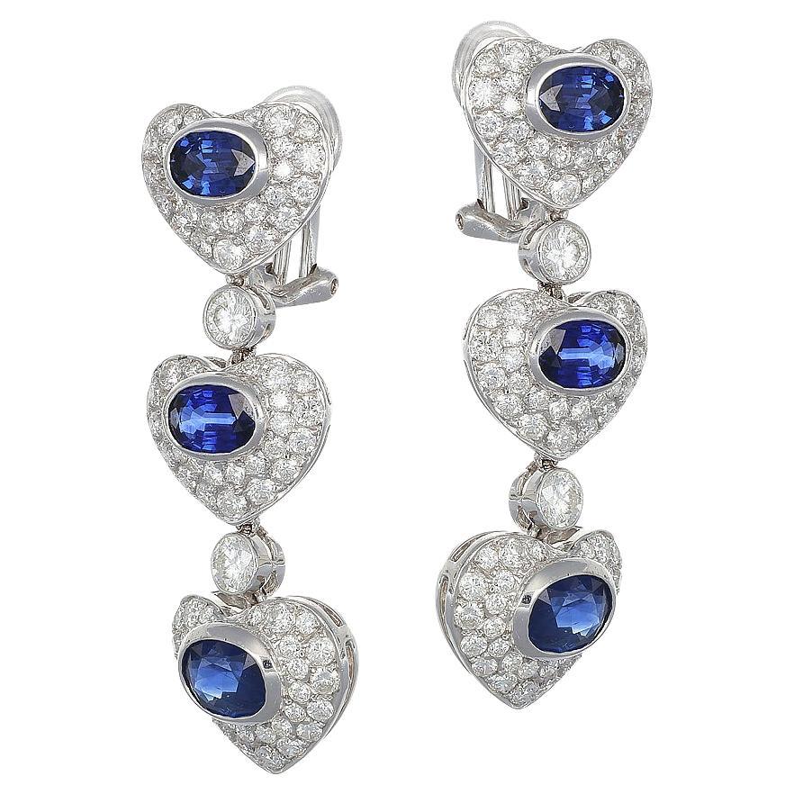 AIG 4.00 ct Blue Sapphires 3.85 ct Pavé Diamonds F - VS Heart Pendant Earrings For Sale