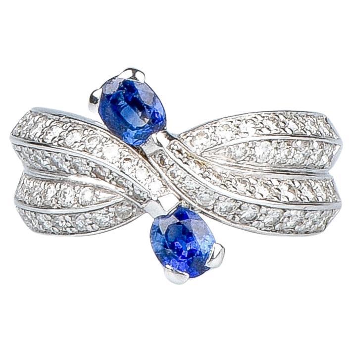 AIG certified 0.80 carat sapphires - 0.64 carat round brillant cut diamonds ring For Sale