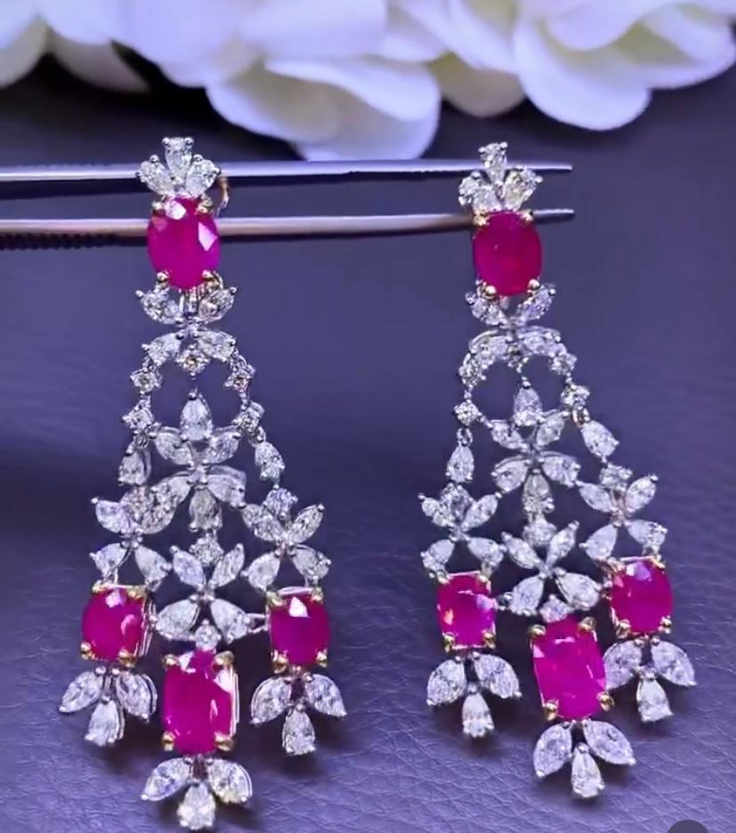 An exclusive pair of earrings in refined design, so beautiful and particular, a very master piece.
Earrings come in 18k gold with 8 pieces of natural Burma Rubies in perfect oval cut, extra fine quality, spectacular color , of 11,08 carats, and   