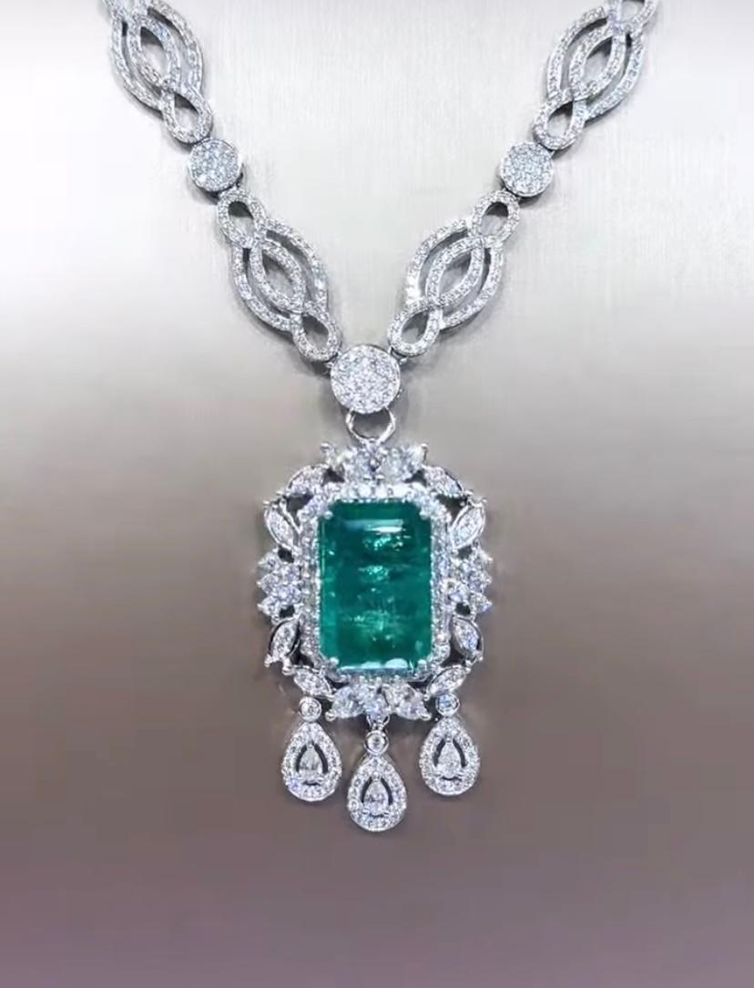 This breathtaking pendant features a 12,00 carat Zambian Emerald and adorned with sparkly diamonds.
Every detail speaks of elegance and rarity.
Jewelry should hold meaning, becoming a cherished part of your story.    
Magnificent pendant come in 18k