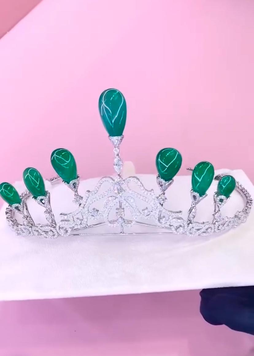 Surprisingly exquisite emeralds and diamonds crown fit for royalty! This stunning piece of jewelry is a true masterpiece, crafted with the finest materials and designed with exceptional attention to detail.
The emeralds and diamonds are carefully