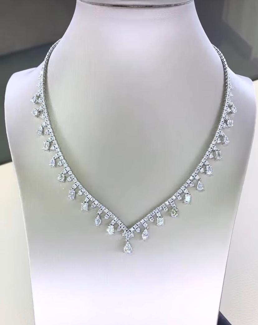 Simply classic, a timeless piece. 
This exquisite necklace features with dazzling diamonds, creating a explosion of light, and make this piece truly breathtaking and showstopper for any occasion. Each sparkling gem tells a unique story of grace and