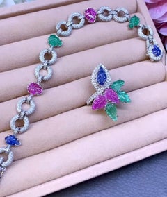 AIG Certified 13.30 Ct Carving Emeralds Rubies Sapphires Diamonds 3.70 Ct  Set