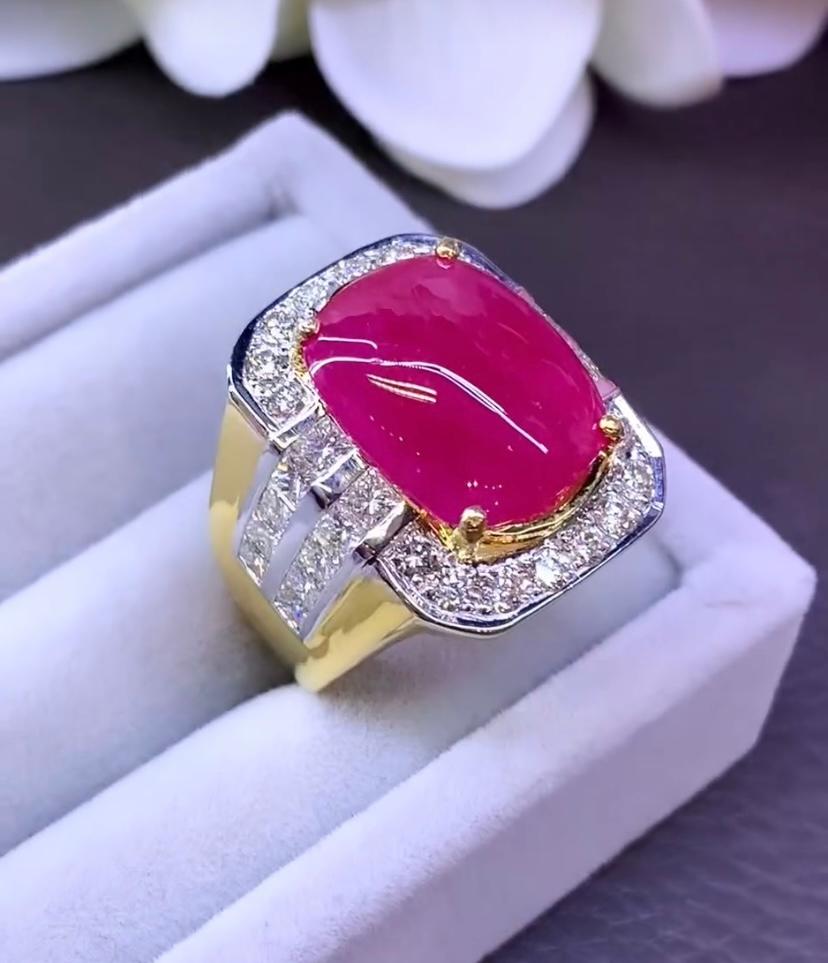 Voici une bague exquise, ornée d'un magnifique rubis de Birmanie et de diamants éblouissants. Cette pièce captivante a été fabriquée à la perfection. La bague met en valeur l'allure vibrante du rubis rouge brillant, rehaussée par l'éclat des