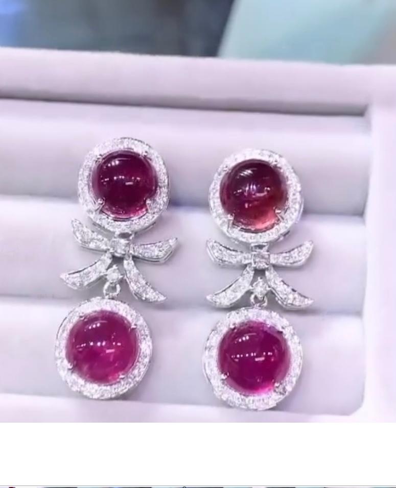 An exclusive pair of earrings in glamour and sophisticated design, so adorable and chic.
Add a touch of style and class with this gorgeous colorful earrings.
Stunning earrings come in 18K gold , with 4 pieces of Natural Rubellite Tourmalines , in