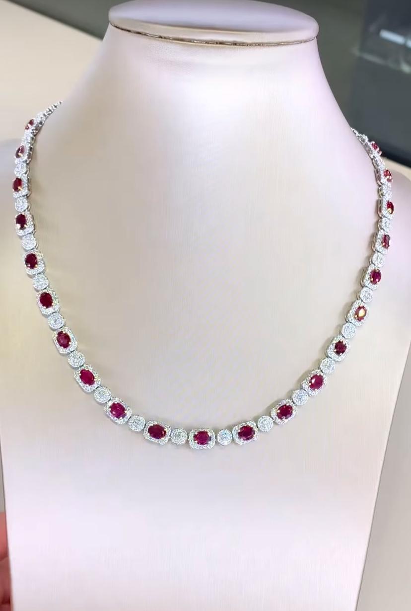 This stunning necklace features with striking Siamese Rubies gemstone in a vibrant color, known for its exceptional brillance. Surrounding the rubies are dazzling diamonds that enhance the overall beauty and elegance of the piece. The combination of
