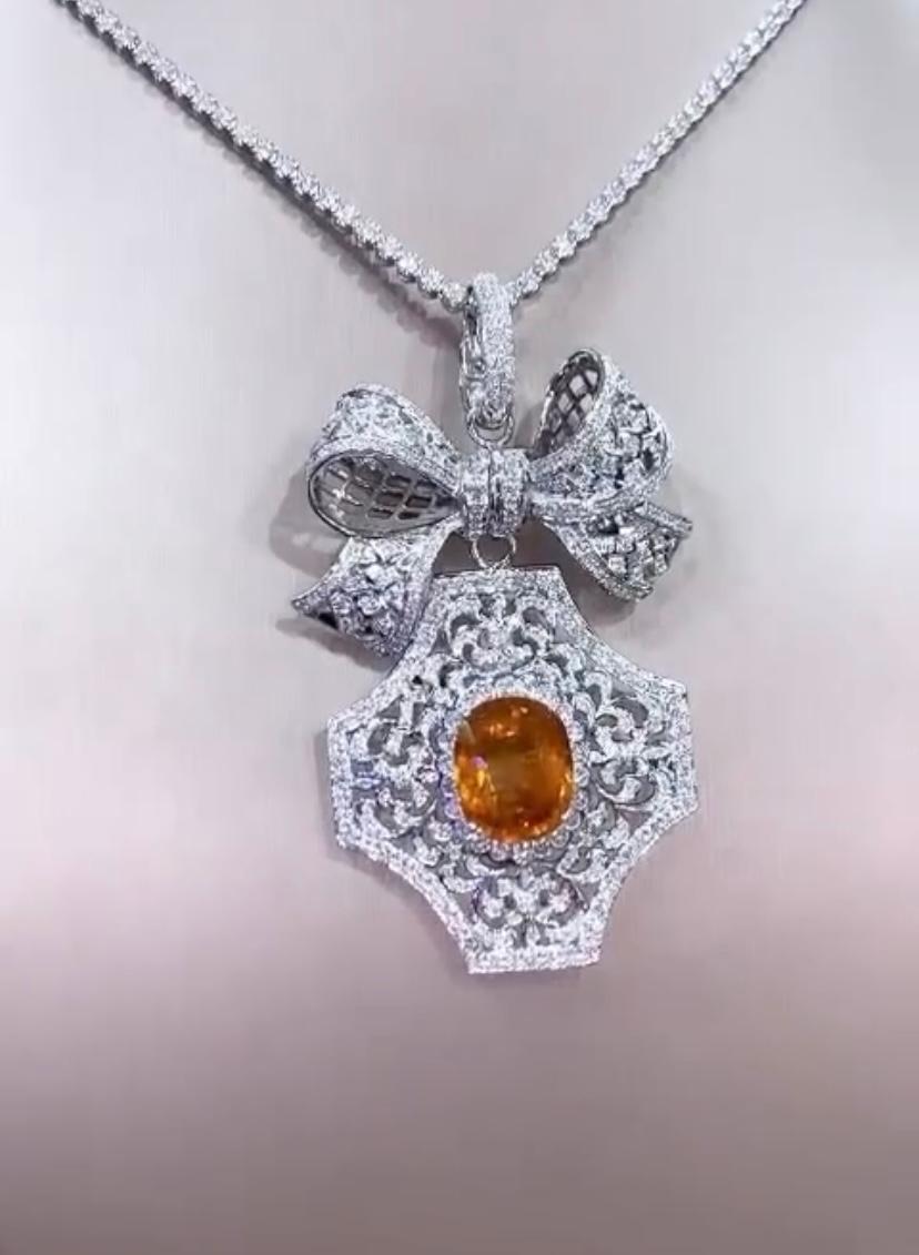 Oval Cut AIG Certified 15.07 Carats Orange Sapphire 3.87 Ct  Diamonds 18K Gold Pendant  For Sale