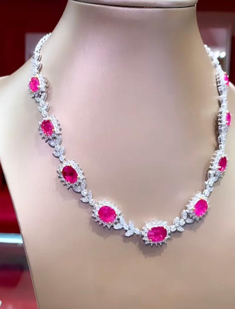 An amazing necklace in flowers design, so adorable and sophisticated collection by Italian designer, expression of class and elegance.
Necklace come in 18K gold with 9 pieces Burma Rubies, fine quality, in perfect oval cut, of 16,23 carats,