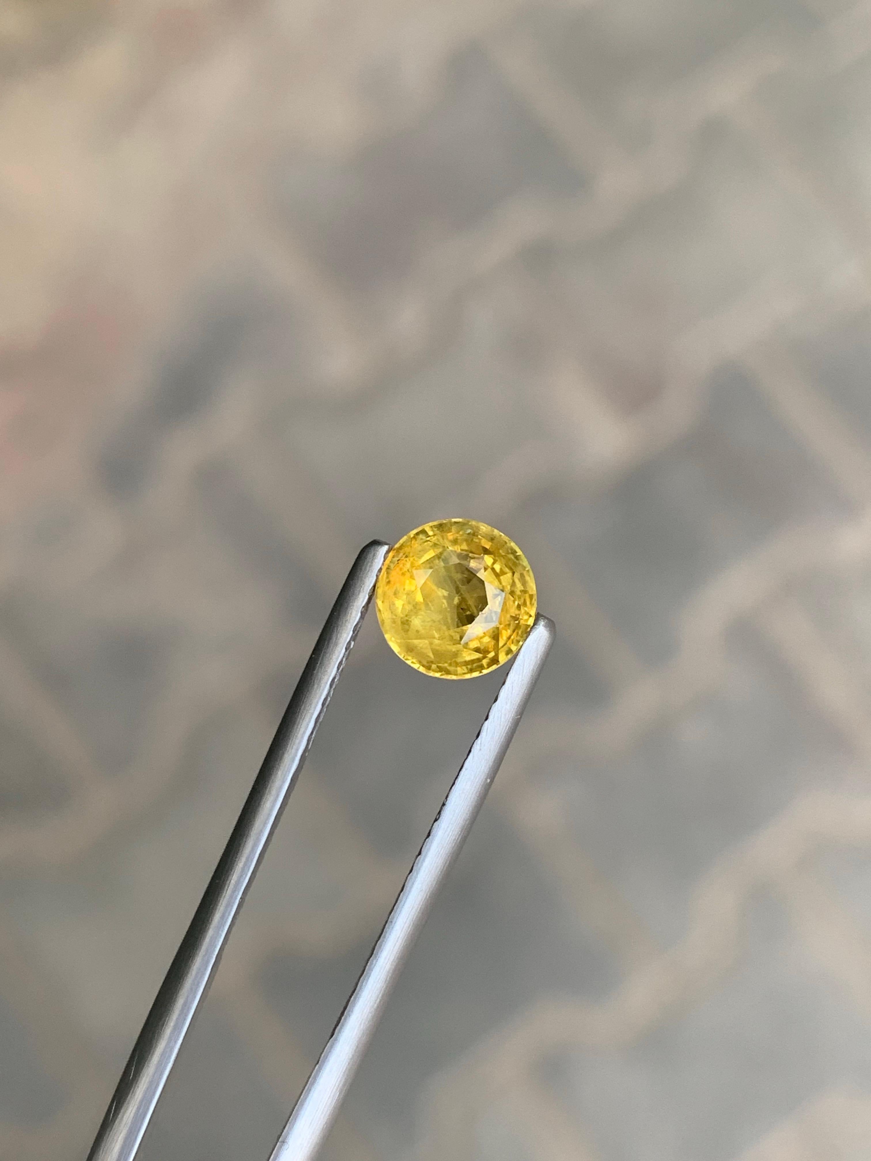 Zaffiro giallo sciolto naturale da 1,63 carati con taglio rotondo certificato AIG in vendita 4