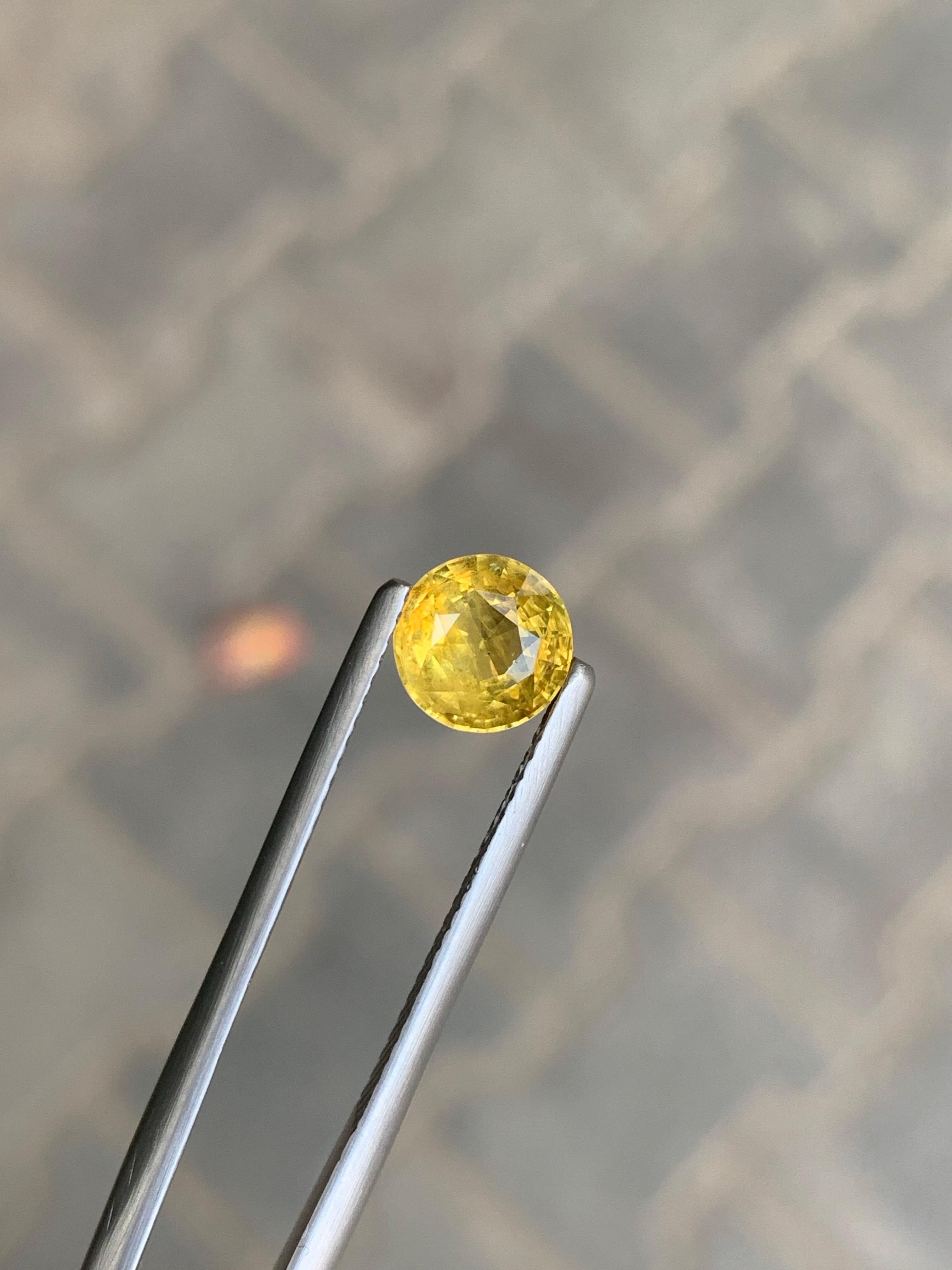 Zaffiro giallo sciolto naturale da 1,63 carati con taglio rotondo certificato AIG in vendita 5