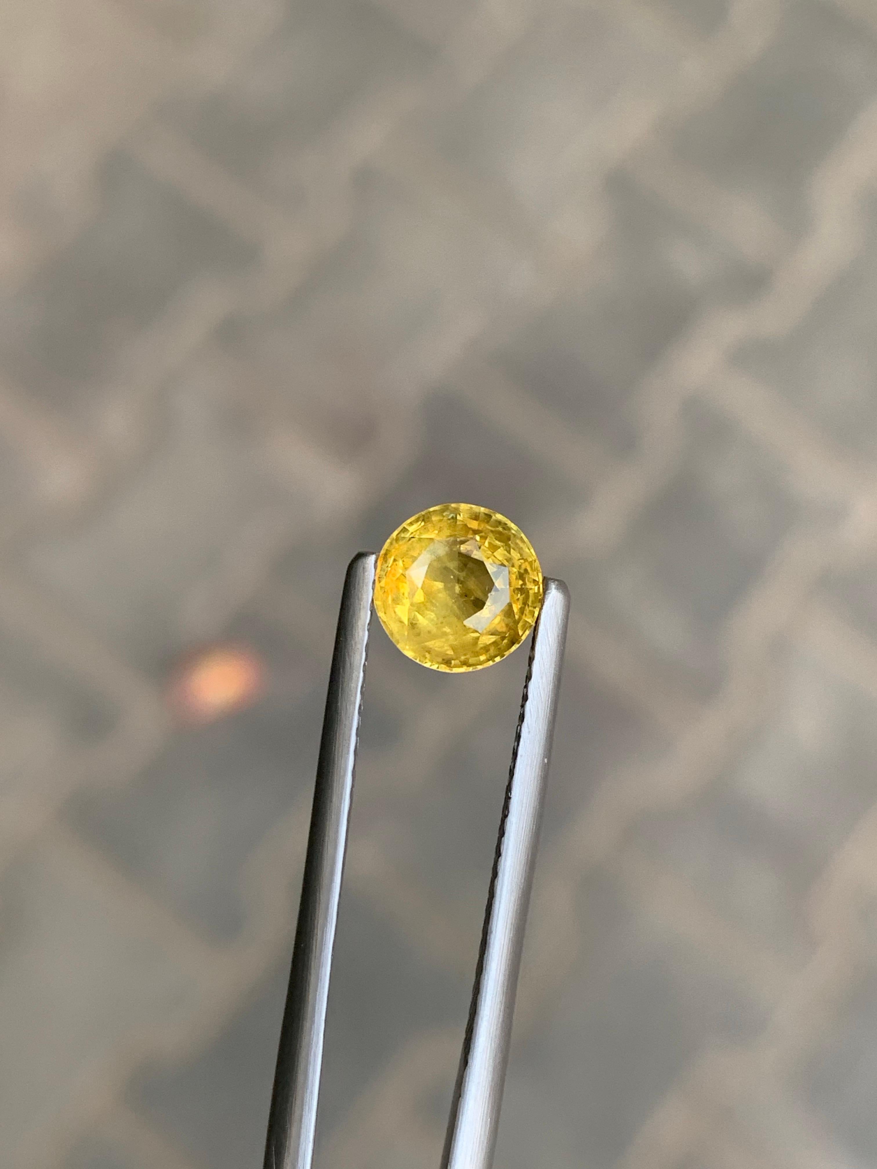 Zaffiro giallo sciolto naturale da 1,63 carati con taglio rotondo certificato AIG in vendita 7