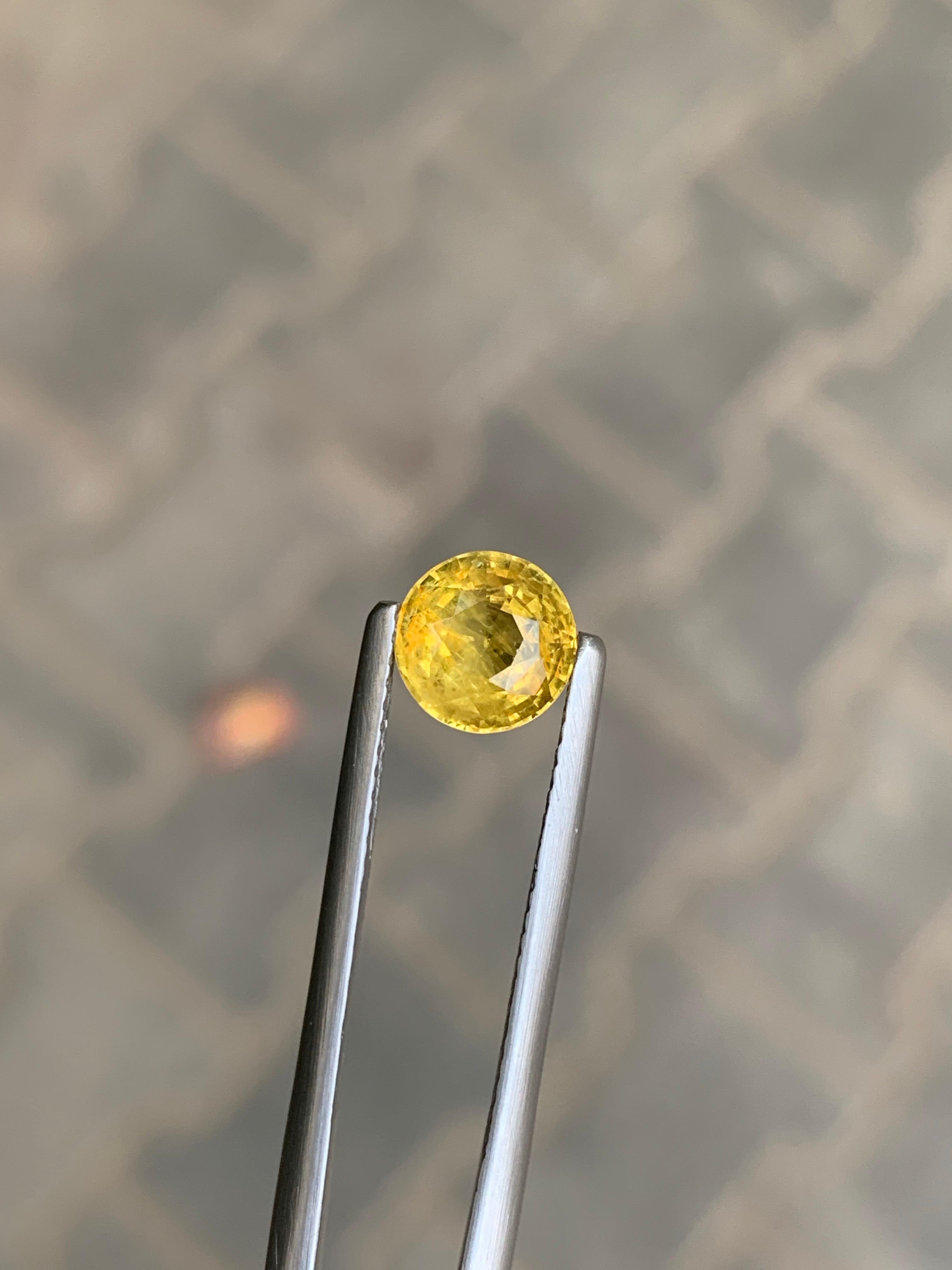 Zaffiro giallo sciolto naturale da 1,63 carati con taglio rotondo certificato AIG in vendita 3