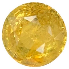 Zaffiro giallo sciolto naturale da 1,63 carati con taglio rotondo certificato AIG