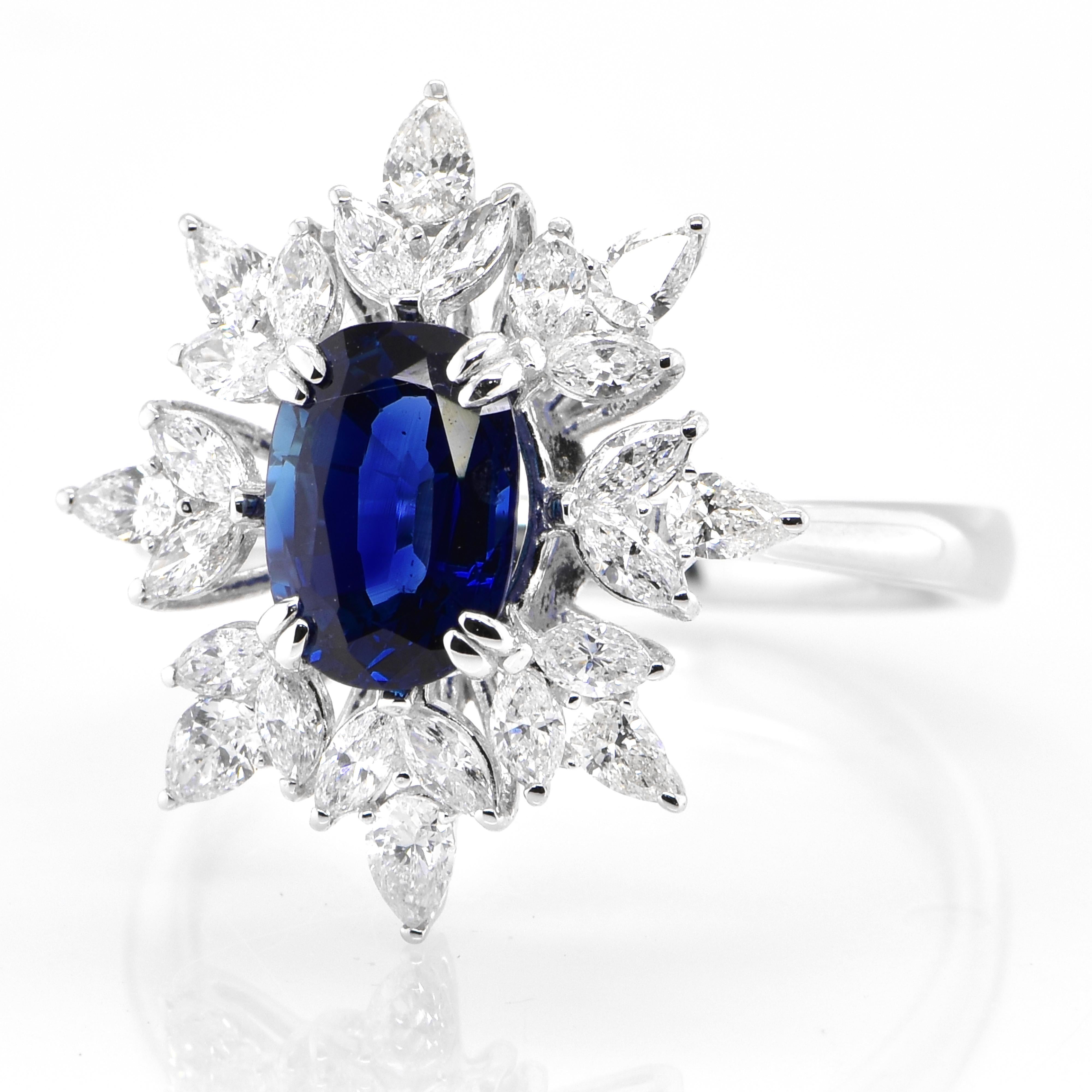 A beautiful ring featuring a AIGS Certified 1.80 Carat Natural Unheated, Royal Blue Blue Sapphire and 0.82 Carats Diamond Accents set in Platinum. Sapphires have extraordinary durability - they excel in hardness as well as toughness and durability