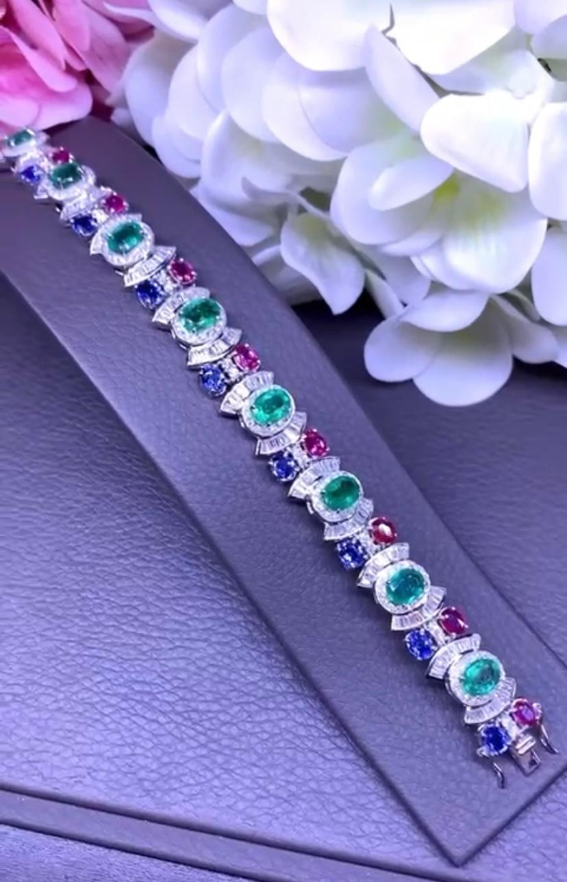 Oval Cut AIG Certified 18.00 Ct  Emeralds Siam Rubies Ceylon Sapphires 18K Gold Bracelet For Sale