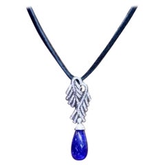 AIG certified 18.20 Ct Tanzanite Diamonds 0.90 Ct 18K Gold Pendant