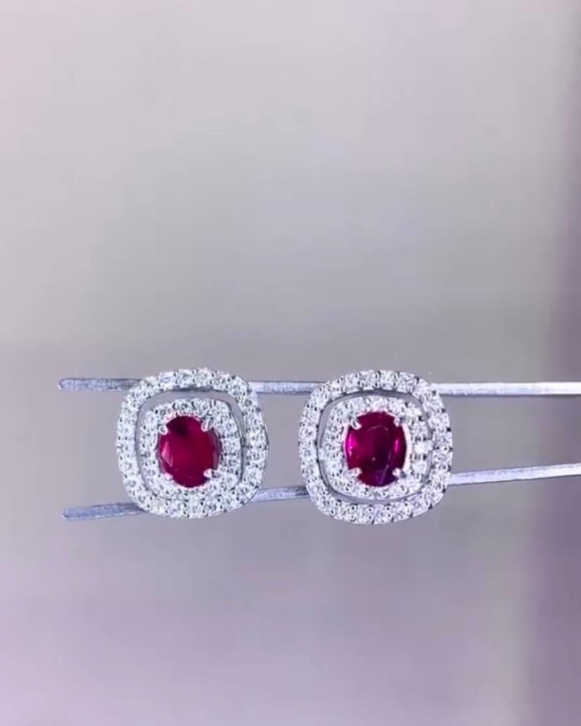 An exquisite Rubies and Diamonds in contemporary design, so elegant and chic style.
Adds a touch of sophistication and class on your look.
Stunning earrings come in 18k gold with a 2 pieces of lustrous Natural Siamese Rubies of 2,00 carats, in