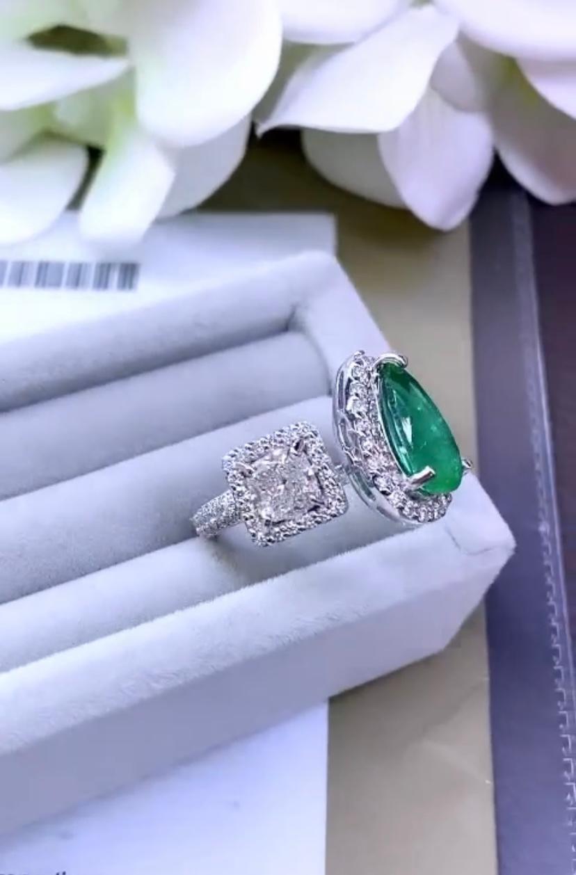 Pear Cut AIG Certified 2.00 Carat Zambian Emerald GIA Certified 1.00 Ct Diamond Ring For Sale