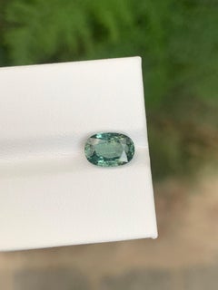 AIG Certified 2.11 Carat Natural Loose Teal Sapphire Oval Shape Gemstone