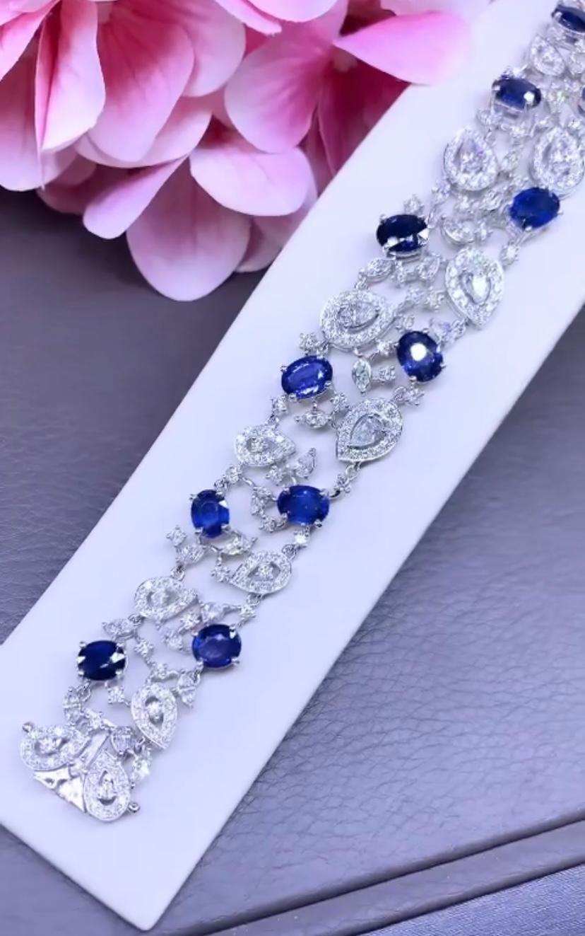 An enchanting essence of a magnificent bracelet. This radiant creation is bedecked with a splendid array of glistening diamonds and vibrant sapphires. 
Adorned with a captivating 22 carats blues sapphires, this unparalleled masterpiece is simply
