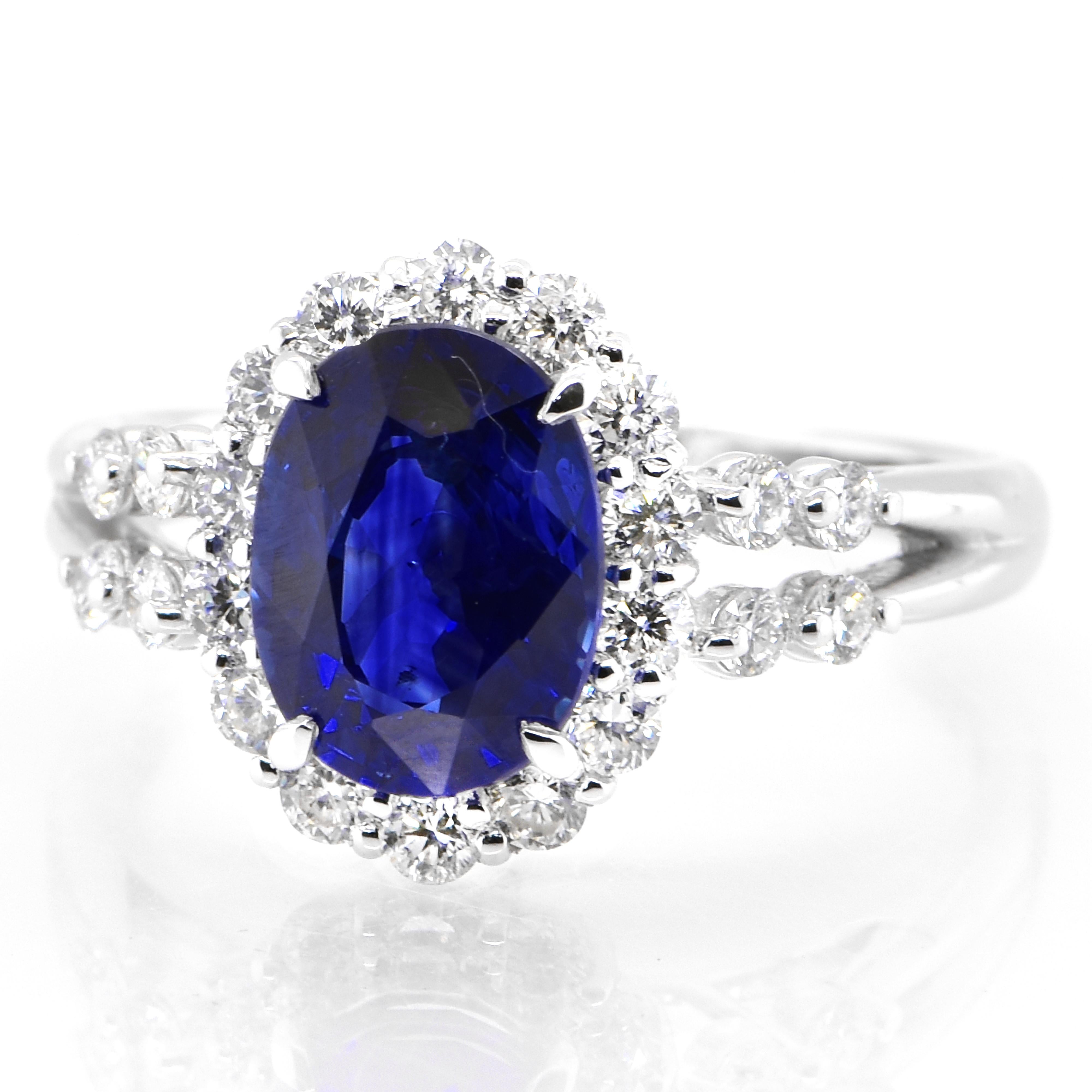A beautiful ring featuring a AIGS Certified 2.33 Carat Royal Blue Blue Sapphire and 0.61 Carats Diamond Accents set in Platinum. Sapphires have extraordinary durability - they excel in hardness as well as toughness and durability making them very