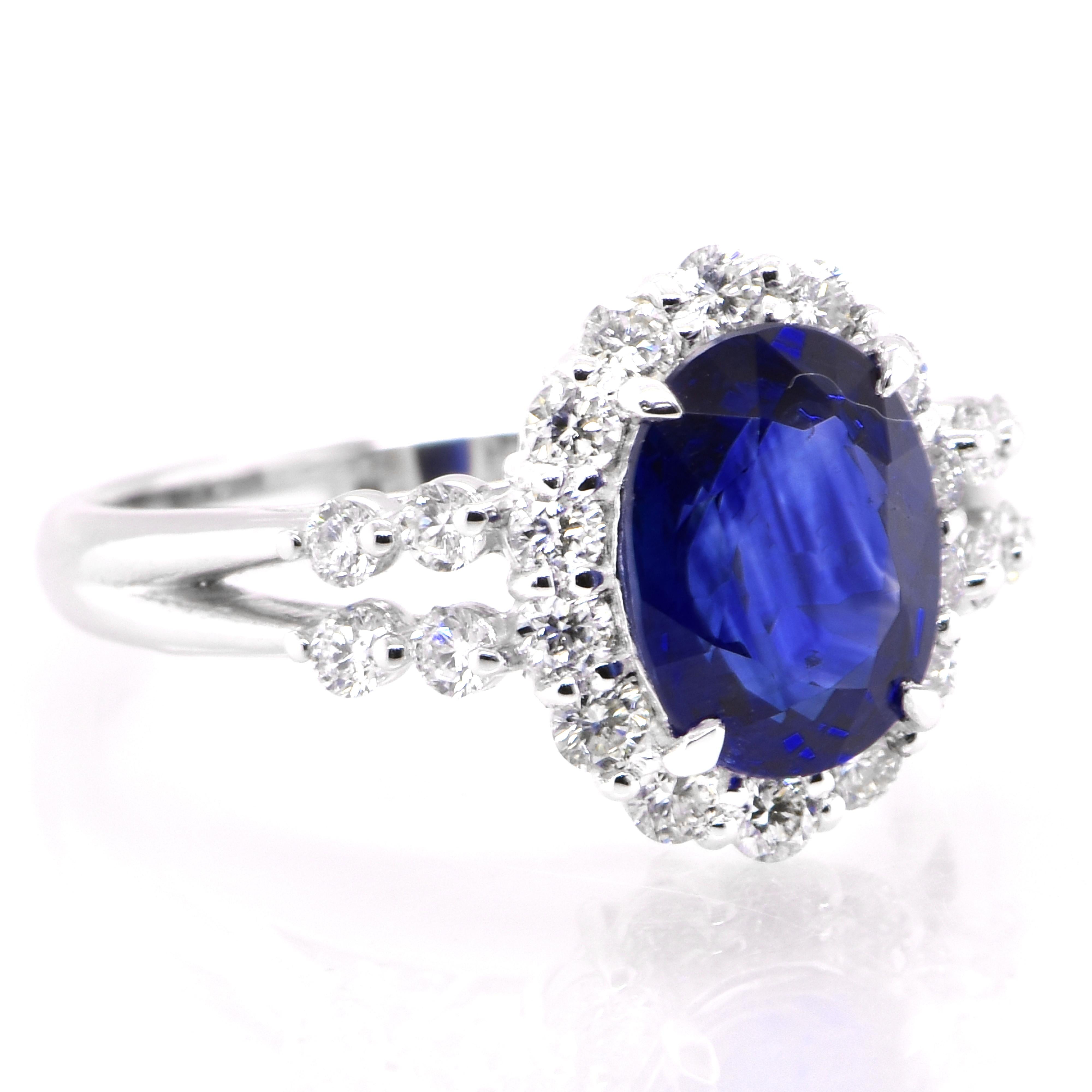 Modern AIG Certified 2.33 Carat Royal Blue Sapphire and Diamond Set in Platinum For Sale
