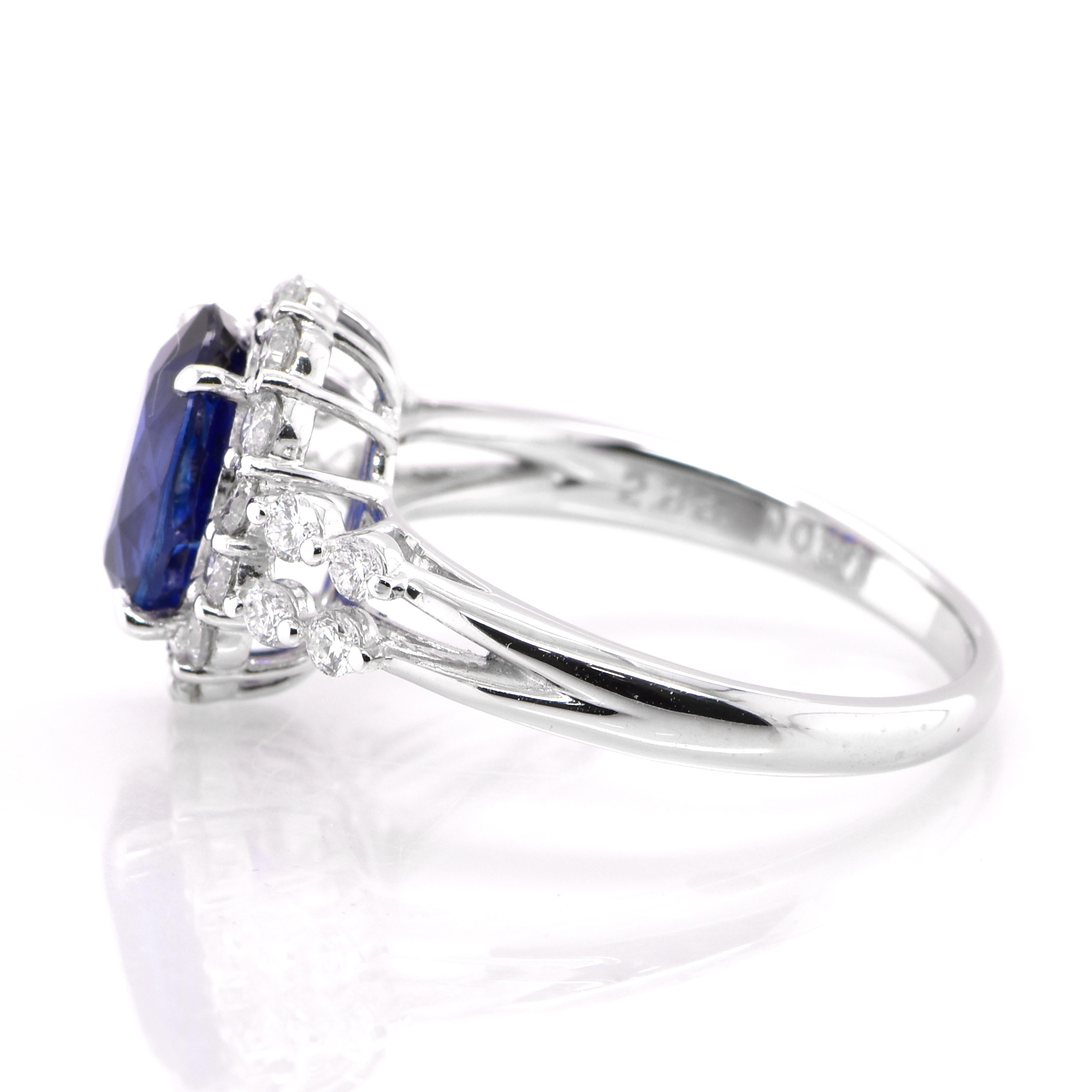 Oval Cut AIG Certified 2.33 Carat Royal Blue Sapphire and Diamond Set in Platinum For Sale
