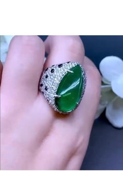 AIG Certified 23.42 Carats Zambian Emerald.  2.91 Carats Diamonds 18K Gold Ring