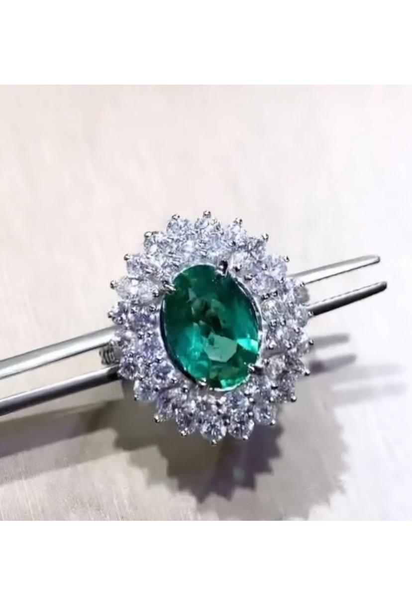 Oval Cut AIG Certified 2.40 Ct Zambian Emerald 2.60 Ct Diamonds 18K Gold Ring  For Sale