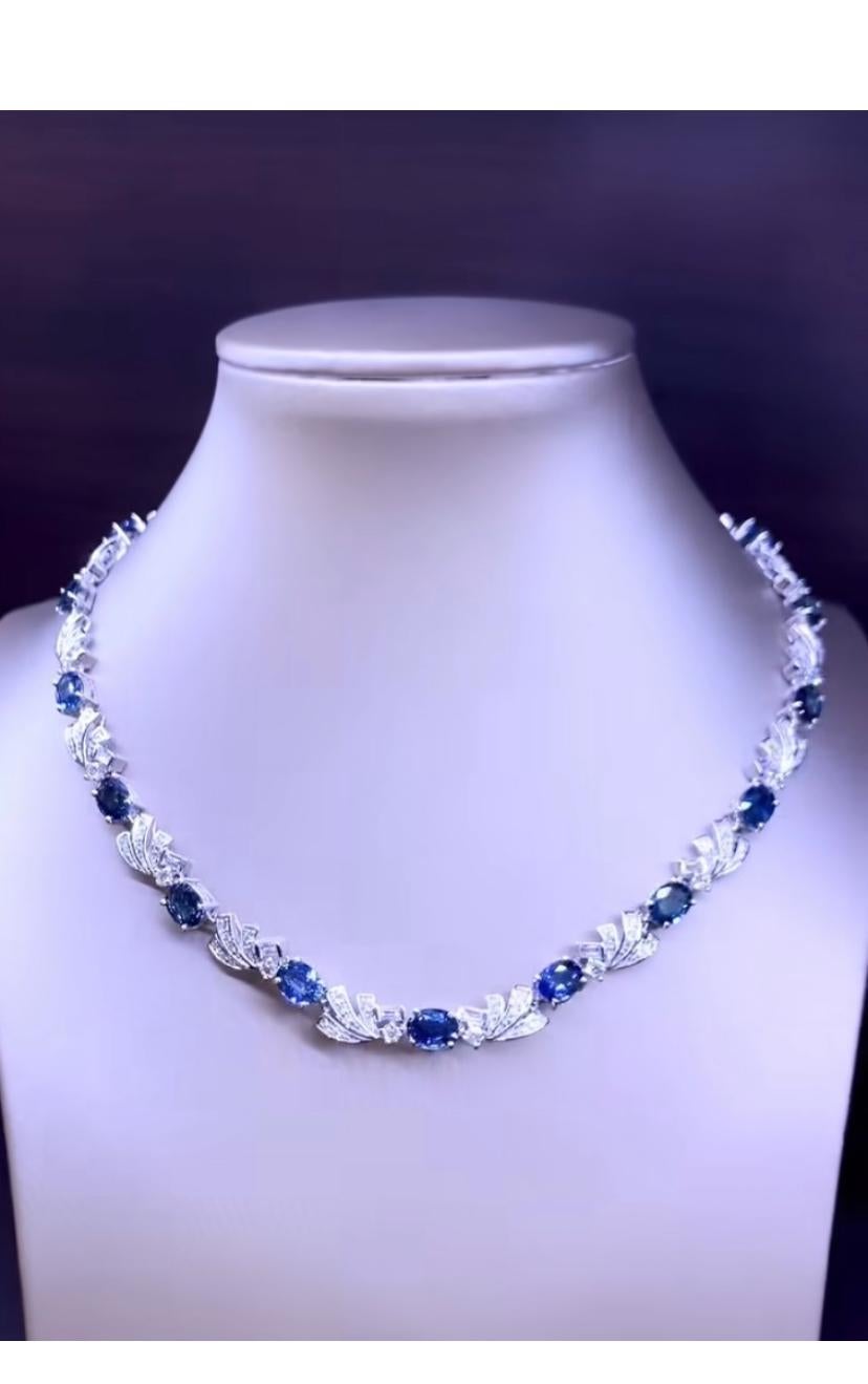 An exclusive contemporary design, so glamour  enchanting, refined details, from Italian designer.
Necklace come in 18k gold with 17 pieces of natural Ceylon sapphires, oval cut, fine quality, 25.68 carats, and 144 pieces of natural diamonds in round