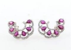 AIG Certified 2.57 Carat Rubies and 0.80 Carat Diamonds, 18 Karat Gold Earrings