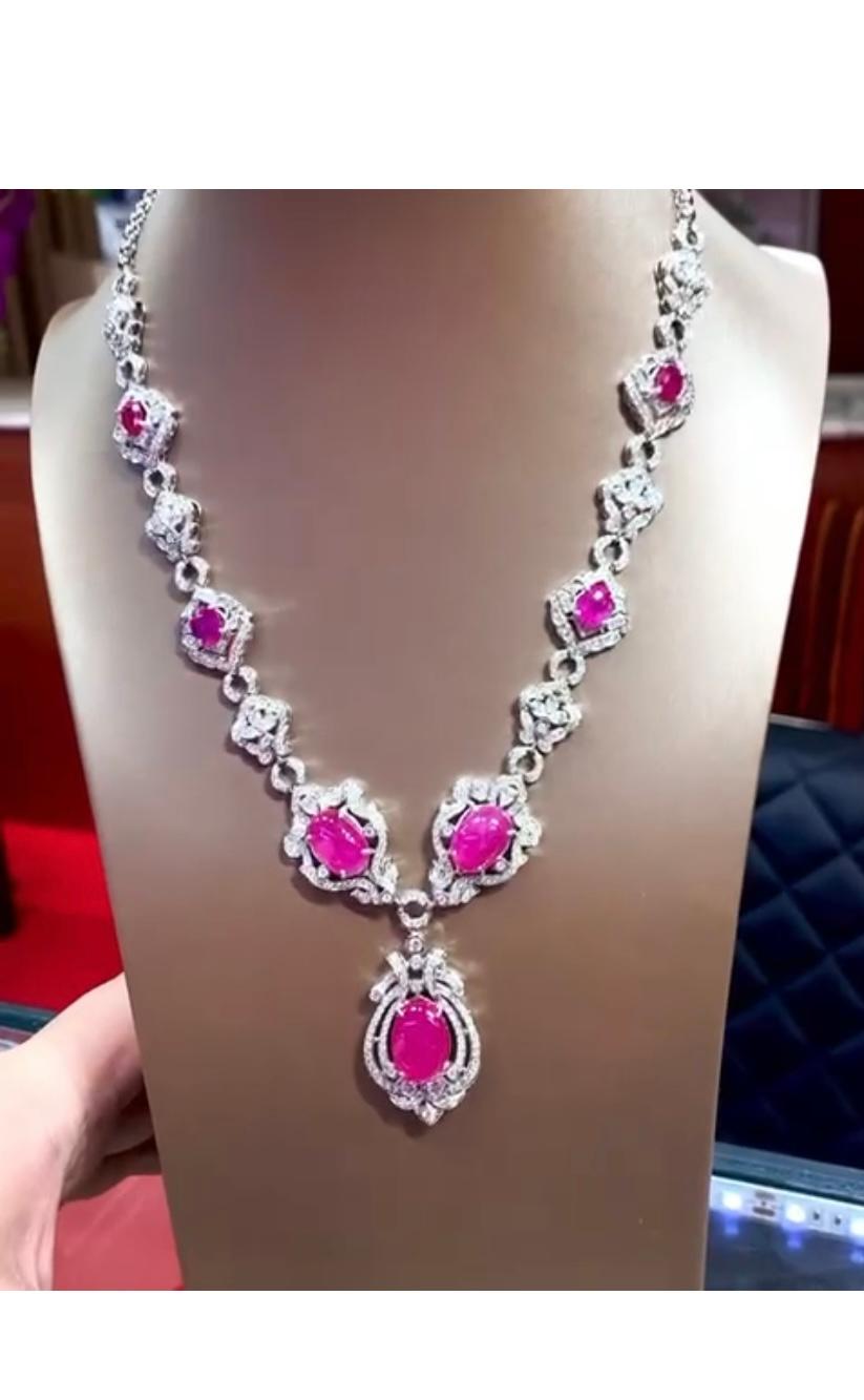 An exquisite necklace in Art Deco design , chic and elegant , a very piece of art.
Necklace come in 18k gold with 7 pieces of Burma rubies in oval cabochon cut ,fine quality, of 27,33 carats and natural diamonds of 8,31 carats F/VS.
Handcrafted by