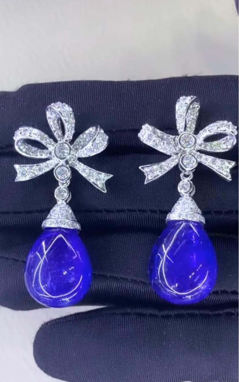Boucles d'oreilles exquises en Tanzanite et Diamants, au design floral sophistiqué, si original et d'un style particulier.
Rehaussez votre beauté intemporelle et ajoutez une touche de charme et de glamour à votre look.
Superbes boucles d'oreilles en
