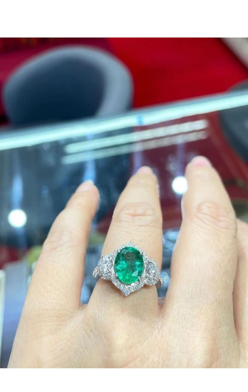 AIG Certified 2.82 Ct Zambian Emerald 1.00 Ct Diamonds 18k Gold Ring For Sale 7