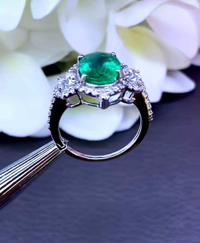Oval Cut AIG Certified 2.82 Ct Zambian Emerald 1.00 Ct Diamonds 18k Gold Ring For Sale